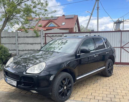 Черный Порше Каен, объемом двигателя 3.2 л и пробегом 300 тыс. км за 7800 $, фото 1 на Automoto.ua