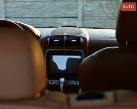 Черный Порше Каен, объемом двигателя 4.5 л и пробегом 282 тыс. км за 7500 $, фото 12 на Automoto.ua