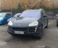 Черный Порше Каен, объемом двигателя 4.8 л и пробегом 170 тыс. км за 10400 $, фото 1 на Automoto.ua