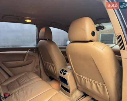 Черный Порше Каен, объемом двигателя 4.81 л и пробегом 195 тыс. км за 6900 $, фото 24 на Automoto.ua