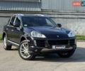 Чорний Порше Cayenne, об'ємом двигуна 4.81 л та пробігом 176 тис. км за 9299 $, фото 1 на Automoto.ua