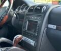 Черный Порше Каен, объемом двигателя 4.8 л и пробегом 199 тыс. км за 9999 $, фото 74 на Automoto.ua