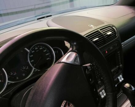 Черный Порше Каен, объемом двигателя 4.8 л и пробегом 164 тыс. км за 6650 $, фото 1 на Automoto.ua