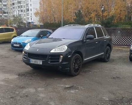 Черный Порше Каен, объемом двигателя 4.8 л и пробегом 170 тыс. км за 10400 $, фото 1 на Automoto.ua