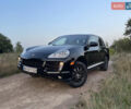Черный Порше Каен, объемом двигателя 3.6 л и пробегом 149 тыс. км за 13500 $, фото 1 на Automoto.ua