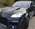 Черный Порше Каен, объемом двигателя 4.8 л и пробегом 150 тыс. км за 7700 $, фото 1 на Automoto.ua