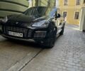 Черный Порше Каен, объемом двигателя 4.8 л и пробегом 170 тыс. км за 12900 $, фото 1 на Automoto.ua