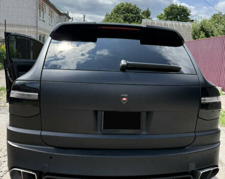 Черный Порше Каен, объемом двигателя 4.81 л и пробегом 178 тыс. км за 9431 $, фото 1 на Automoto.ua