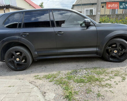 Черный Порше Каен, объемом двигателя 4.81 л и пробегом 178 тыс. км за 9431 $, фото 3 на Automoto.ua