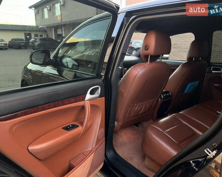 Черный Порше Каен, объемом двигателя 3.6 л и пробегом 232 тыс. км за 12500 $, фото 21 на Automoto.ua