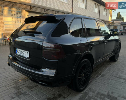 Черный Порше Каен, объемом двигателя 3.6 л и пробегом 232 тыс. км за 12500 $, фото 4 на Automoto.ua
