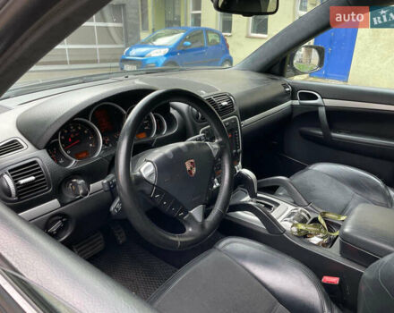 Черный Порше Каен, объемом двигателя 4.81 л и пробегом 148 тыс. км за 9000 $, фото 4 на Automoto.ua