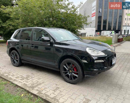 Черный Порше Каен, объемом двигателя 4.81 л и пробегом 148 тыс. км за 10500 $, фото 1 на Automoto.ua