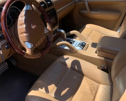 Черный Порше Каен, объемом двигателя 4.8 л и пробегом 150 тыс. км за 12500 $, фото 2 на Automoto.ua