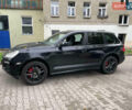Черный Порше Каен, объемом двигателя 4.81 л и пробегом 148 тыс. км за 10500 $, фото 2 на Automoto.ua