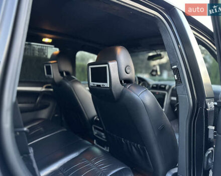 Черный Порше Каен, объемом двигателя 4.8 л и пробегом 145 тыс. км за 15700 $, фото 2 на Automoto.ua