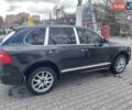 Черный Порше Каен, объемом двигателя 3.6 л и пробегом 230 тыс. км за 13000 $, фото 1 на Automoto.ua