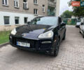 Черный Порше Каен, объемом двигателя 4.81 л и пробегом 148 тыс. км за 10500 $, фото 1 на Automoto.ua