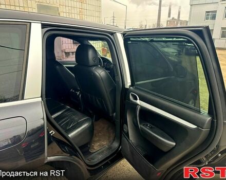 Черный Порше Каен, объемом двигателя 4.8 л и пробегом 178 тыс. км за 12700 $, фото 11 на Automoto.ua