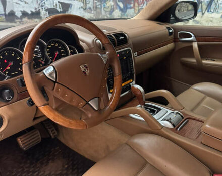 Черный Порше Каен, объемом двигателя 4.8 л и пробегом 140 тыс. км за 8500 $, фото 10 на Automoto.ua