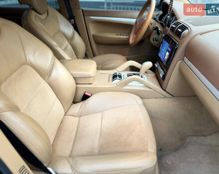 Черный Порше Каен, объемом двигателя 4.8 л и пробегом 178 тыс. км за 8900 $, фото 45 на Automoto.ua