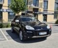Черный Порше Каен, объемом двигателя 4.8 л и пробегом 265 тыс. км за 10000 $, фото 1 на Automoto.ua