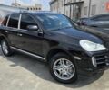 Черный Порше Каен, объемом двигателя 4.81 л и пробегом 111 тыс. км за 9700 $, фото 1 на Automoto.ua