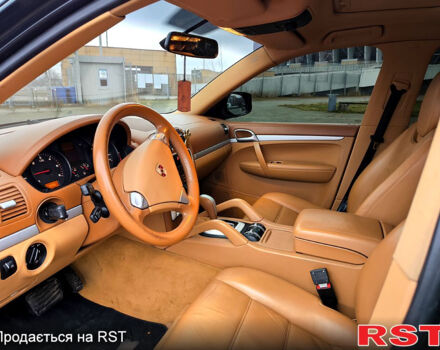 Черный Порше Каен, объемом двигателя 3 л и пробегом 249 тыс. км за 14900 $, фото 2 на Automoto.ua