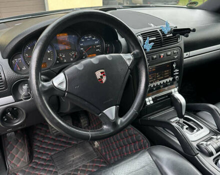 Черный Порше Каен, объемом двигателя 2.97 л и пробегом 261 тыс. км за 18200 $, фото 12 на Automoto.ua