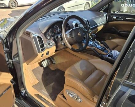 Черный Порше Каен, объемом двигателя 4.8 л и пробегом 105 тыс. км за 25900 $, фото 6 на Automoto.ua