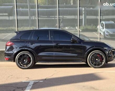 Черный Порше Каен, объемом двигателя 4.8 л и пробегом 105 тыс. км за 25900 $, фото 5 на Automoto.ua