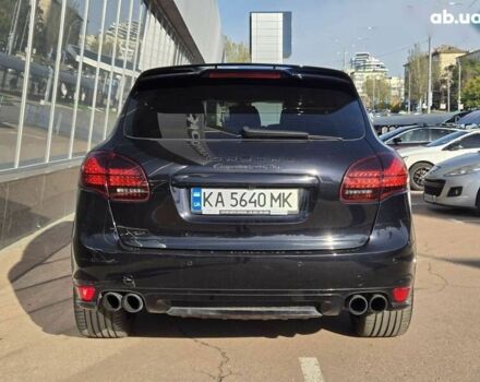 Черный Порше Каен, объемом двигателя 4.8 л и пробегом 105 тыс. км за 25900 $, фото 4 на Automoto.ua