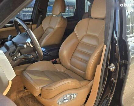 Черный Порше Каен, объемом двигателя 4.8 л и пробегом 105 тыс. км за 25900 $, фото 7 на Automoto.ua