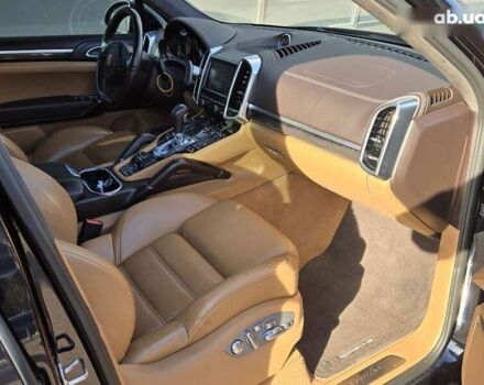 Черный Порше Каен, объемом двигателя 4.8 л и пробегом 105 тыс. км за 25900 $, фото 9 на Automoto.ua