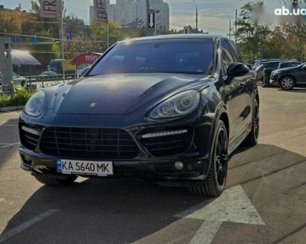 Черный Порше Каен, объемом двигателя 4.8 л и пробегом 105 тыс. км за 25900 $, фото 1 на Automoto.ua