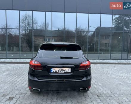 Черный Порше Каен, объемом двигателя 2.97 л и пробегом 302 тыс. км за 18000 $, фото 5 на Automoto.ua