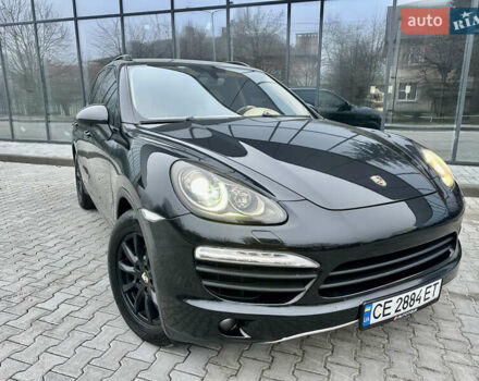 Черный Порше Каен, объемом двигателя 2.97 л и пробегом 302 тыс. км за 18000 $, фото 1 на Automoto.ua