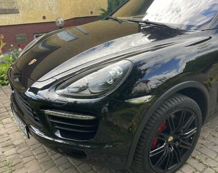 Черный Порше Каен, объемом двигателя 4.81 л и пробегом 136 тыс. км за 26000 $, фото 2 на Automoto.ua