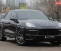 Черный Порше Каен, объемом двигателя 4.81 л и пробегом 152 тыс. км за 21900 $, фото 1 на Automoto.ua