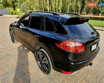 Порше Каен 2013 в Полтаве на Automoto.ua Черный Порше Каен, объемом двигателя 2.97 л и пробегом 258 тыс. км за 20950 $, фото 32 на Automoto.ua
