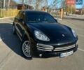 Черный Порше Каен, объемом двигателя 2.97 л и пробегом 220 тыс. км за 25000 $, фото 1 на Automoto.ua