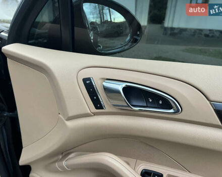 Черный Порше Каен, объемом двигателя 3.6 л и пробегом 274 тыс. км за 24950 $, фото 182 на Automoto.ua