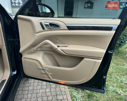 Черный Порше Каен, объемом двигателя 3.6 л и пробегом 274 тыс. км за 24950 $, фото 76 на Automoto.ua