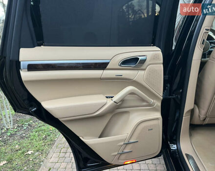 Черный Порше Каен, объемом двигателя 3.6 л и пробегом 274 тыс. км за 24950 $, фото 159 на Automoto.ua