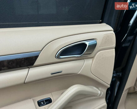 Черный Порше Каен, объемом двигателя 3.6 л и пробегом 274 тыс. км за 24950 $, фото 164 на Automoto.ua