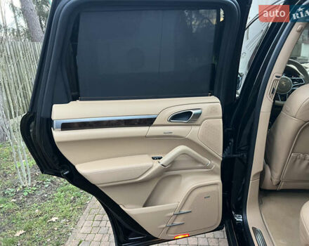 Черный Порше Каен, объемом двигателя 3.6 л и пробегом 274 тыс. км за 24950 $, фото 61 на Automoto.ua