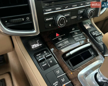 Черный Порше Каен, объемом двигателя 3.6 л и пробегом 274 тыс. км за 24950 $, фото 153 на Automoto.ua