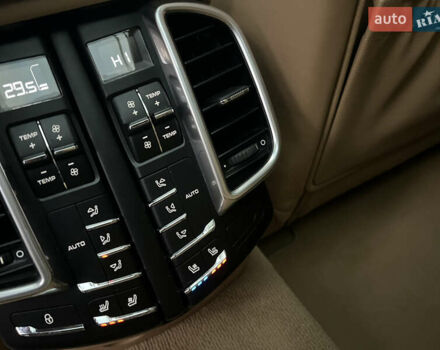 Черный Порше Каен, объемом двигателя 3.6 л и пробегом 274 тыс. км за 24950 $, фото 167 на Automoto.ua