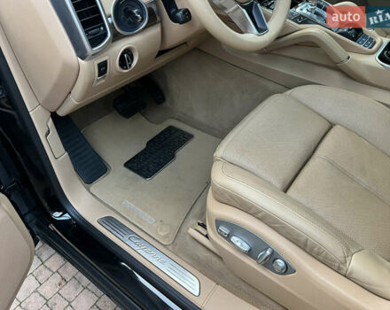 Черный Порше Каен, объемом двигателя 3.6 л и пробегом 274 тыс. км за 24950 $, фото 125 на Automoto.ua