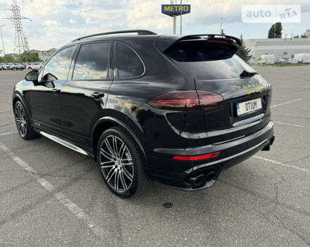 Черный Порше Каен, объемом двигателя 4.81 л и пробегом 100 тыс. км за 51000 $, фото 2 на Automoto.ua